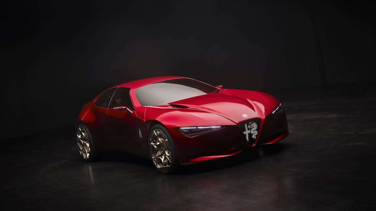 Красное купе Alfa Romeo Cuorerosso в тёмной студии