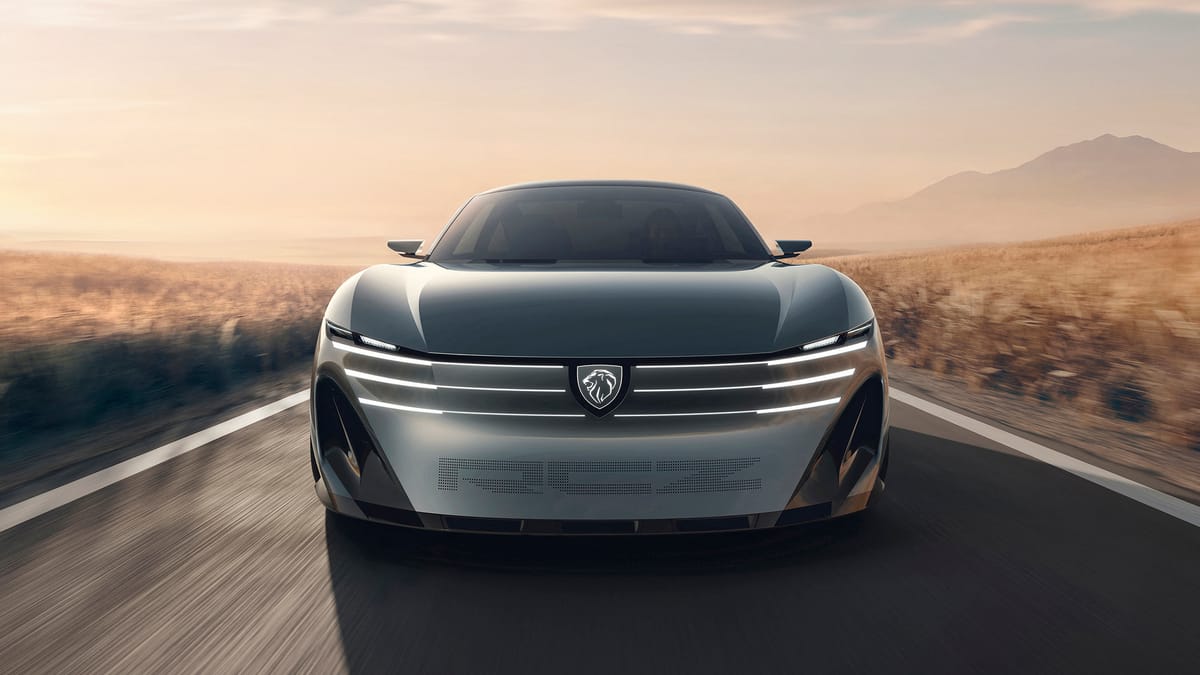 Peugeot RCZ Vision спереди на загородной дороге