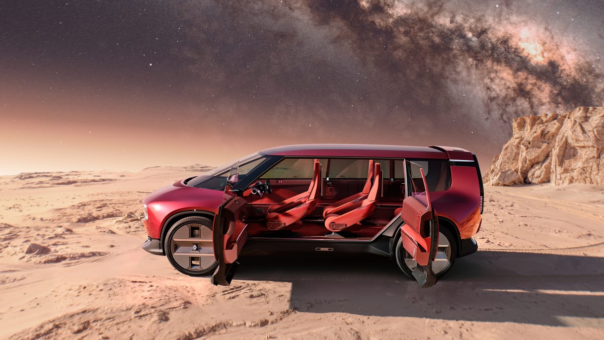 Красный Renault E-Space Concept с открытыми дверями в пустыне
